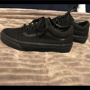 All black vans old skool